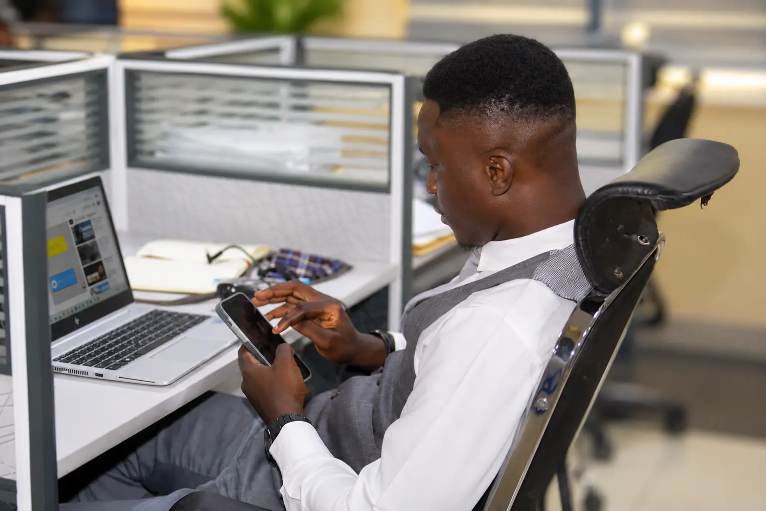 Team member working with digital tools at his workstation