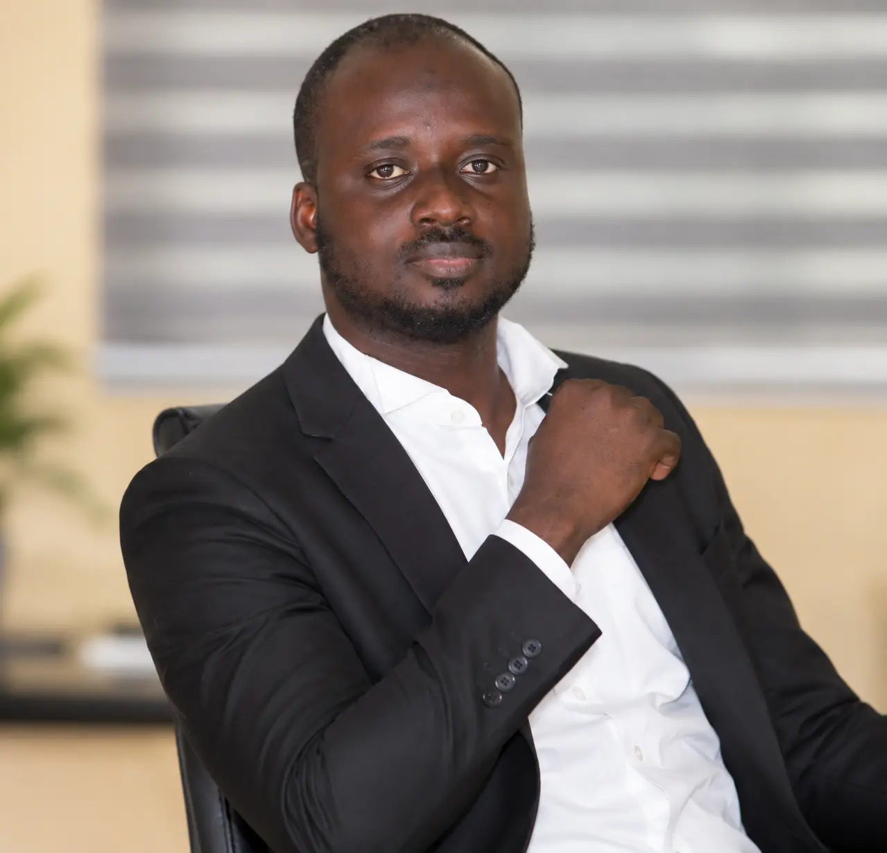 Male legal professional seated in the chambers