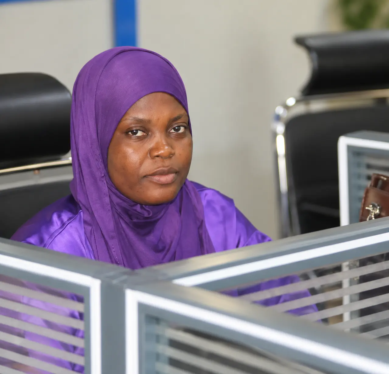 Female team member at an office workstation