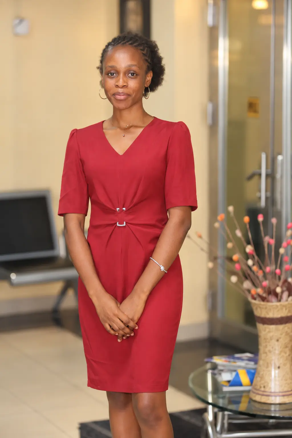Female professional in a full-length office portrait